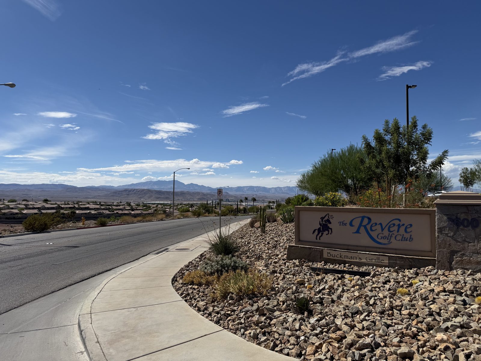 The Revere Golf Club entrance monument on a curving road in Anthem, Henderson, Nevada
