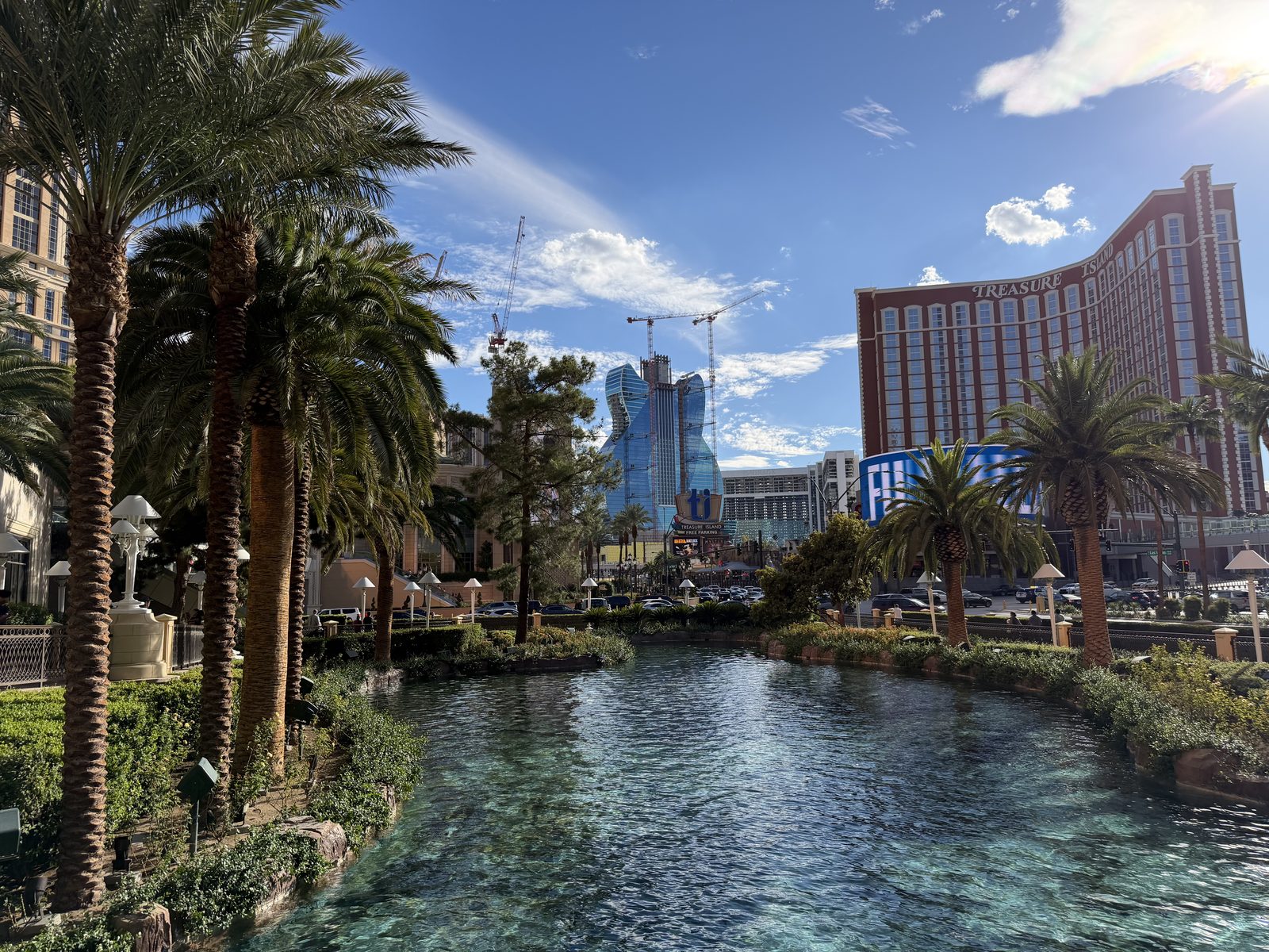 The turquoise lagoon in front of the former Mirage on the Las Vegas Strip, with palms and resort towers behind
