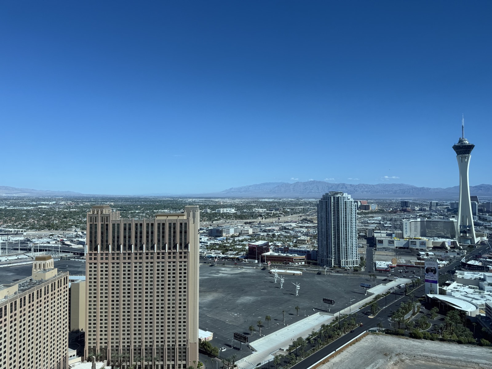 The Las Vegas valley by day, looking north along the Strip toward the Strat and the surrounding mountains